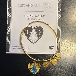Alex and Ani Gold Bracelet with Teardrop Blue Charm